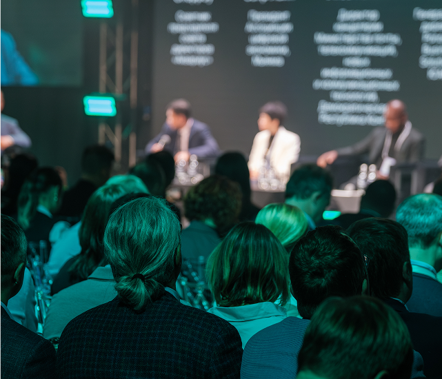 people attending a conference